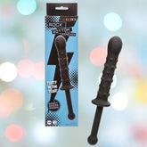 A black, flexible beaded probe made of hygienic silicone from CalExotics, the Rock Bottom Bendies Bendy Beaded Probe, is shown beside its packaging against a blurred pastel background with circular light spots.